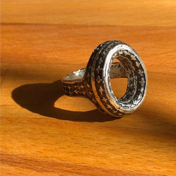 Chunky, handmade, unisex, sterling silver Torus ring with etched pattern. Unique design for men or women by Jason Burton Designs jewelry.